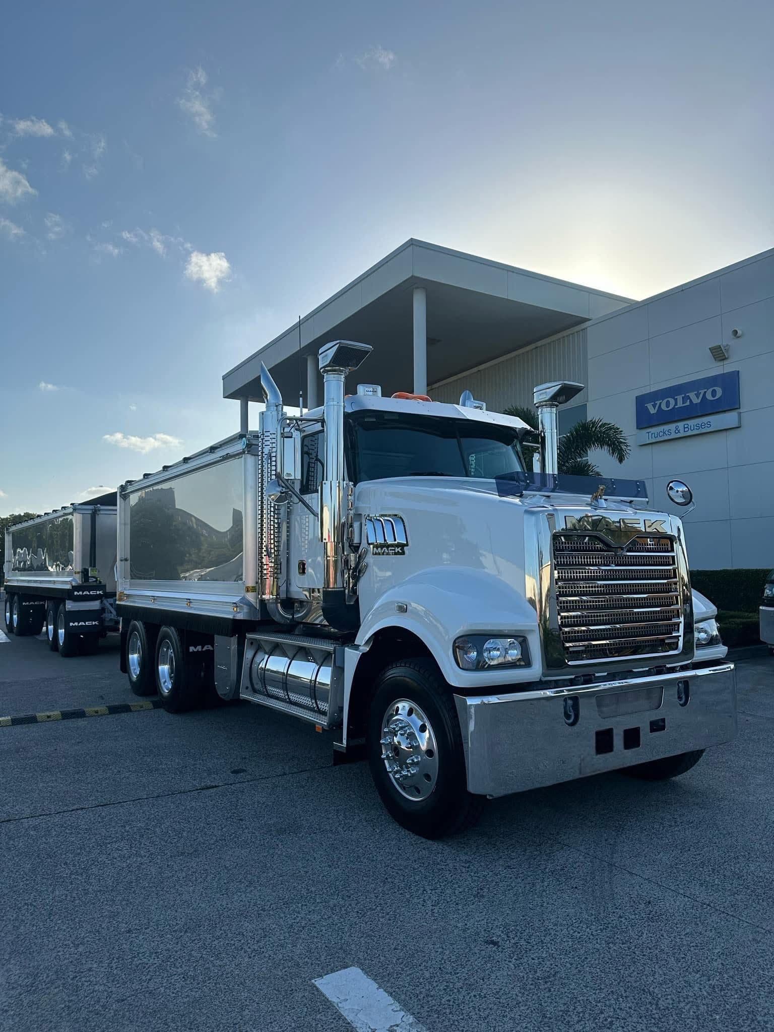 Mack trucks at a Volvo dealership