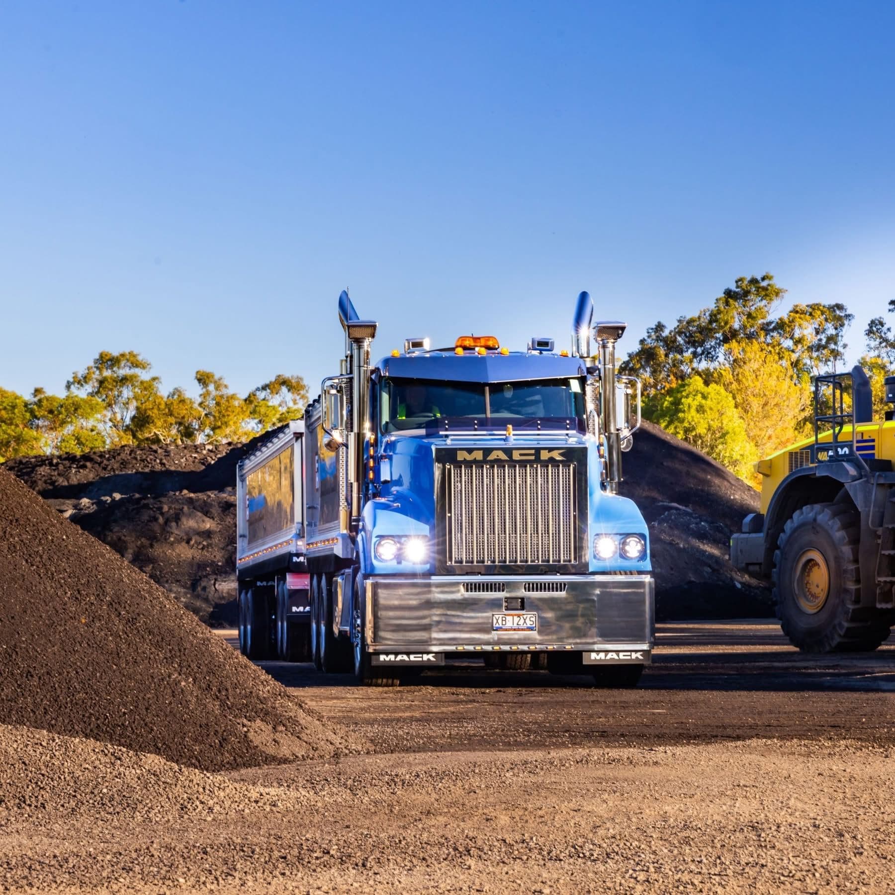Mack truck with loader — equipment finance during business recovery